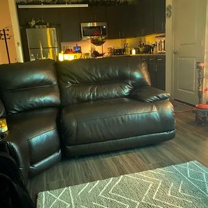 Brown leather sectional sofa and good condition normal wear and tear